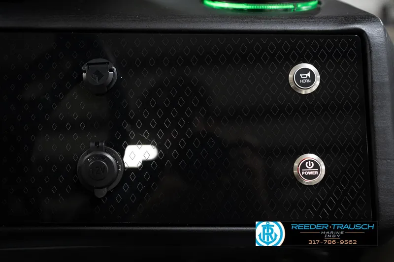 Slide: The Image of Control panel of 2026 Bennington 22 MSB with horn and power buttons, Reeder Trausch Marine logo. - 38
