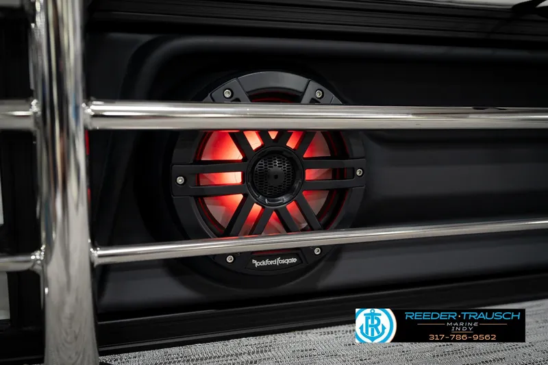 Slide: The Image of 2026 Bennington 22 MSB with illuminated Rockford Fosgate speaker and chrome railing. - 43