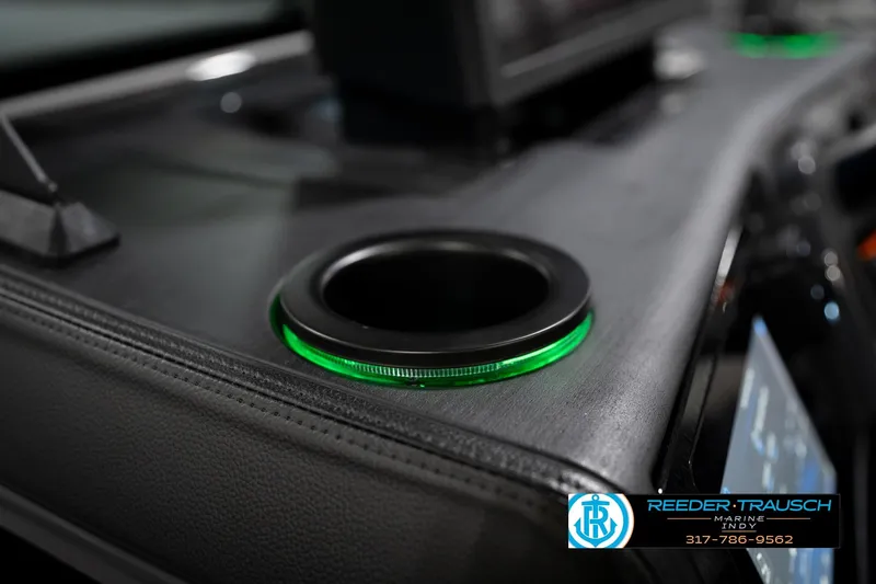Slide: The Image of Illuminated cup holder on 2026 Bennington 22 MSB boat dashboard. - 44
