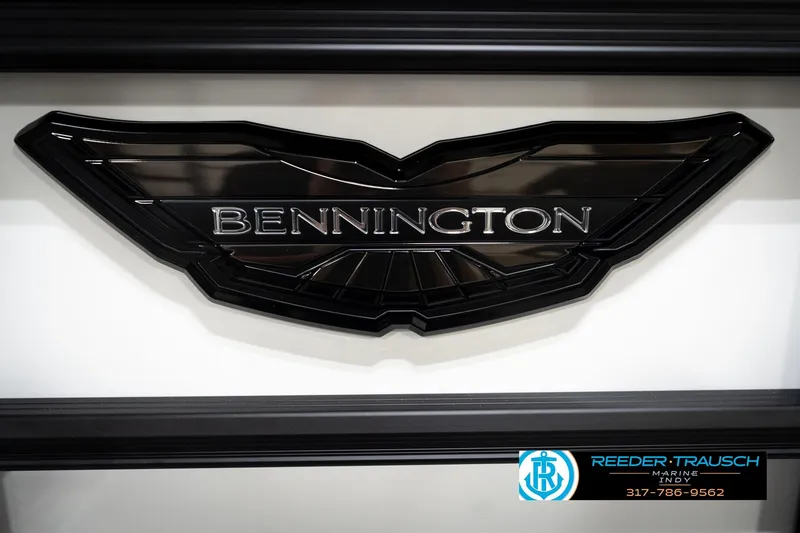 Slide: The Image of Bennington 22 MSB 2026 logo on a sleek black emblem, Reeder-Trausch Marine contact details. - 47