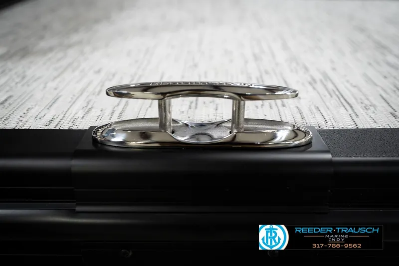 Slide: The Image of 2026 Bennington 22 MSB boat cleat on textured deck surface. - 53