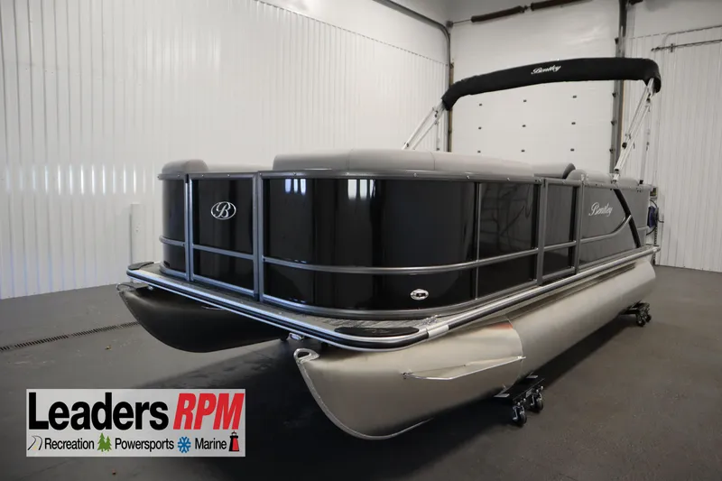 The Image of 2026 Bentley Pontoons LE 180 CR in showroom, sleek design, black exterior, Leaders RPM logo. - 0