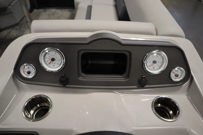 Slide: The Image of Dashboard of 2026 Bentley Pontoons LE 180 CR with gauges and cup holders. - 20
