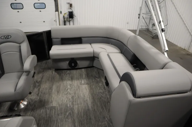Slide: The Image of 2026 Bentley Pontoons LE 180 CR interior with gray seating and modern design. - 25