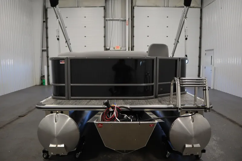 Slide: The Image of 2026 Bentley Pontoons LE 180 CR in a spacious indoor setting. - 5