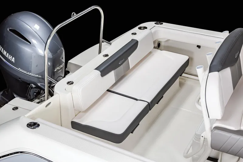 Slide: The Image of Manufacturer Provided Image: 2025 Robalo R222 Explorer boat interior with Yamaha engine and seating area. - 34