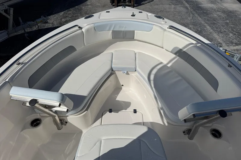 Slide: The Image of 2025 Robalo R222 Explorer boat interior with spacious seating and modern design. - 8