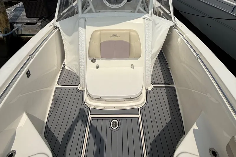 Slide: The Image of 2019 Cobia 277 Center Console boat interior with sleek gray flooring. - 24