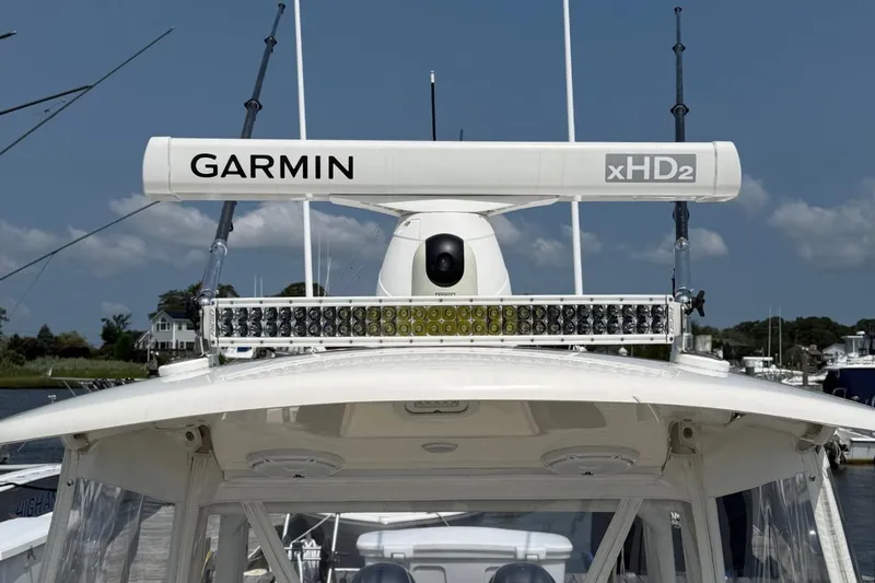 Slide: The Image of 2019 Cobia 277 Center Console with Garmin xHD2 radar on top. - 26