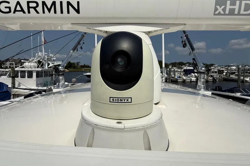 Slide: The Image of 2019 Cobia 277 Center Console with Sionyx camera and Garmin xHD radar at marina. - 27