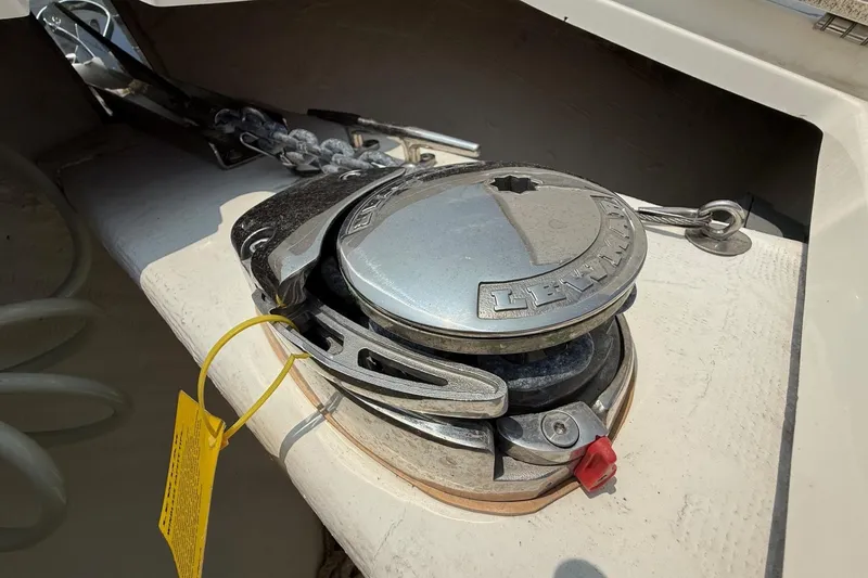 Slide: The Image of 2019 Cobia 277 Center Console boat anchor winch system close-up. - 29