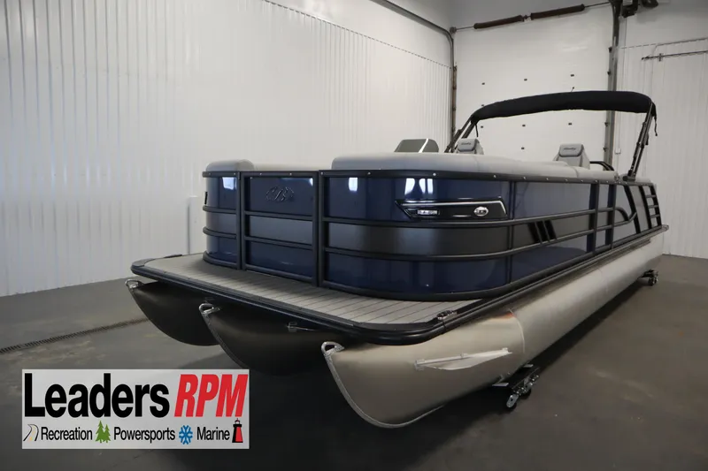 The Image of 2025 Bentley Pontoons Elite 253 Admiral Tri-toon in showroom, Leaders RPM logo visible. - 0