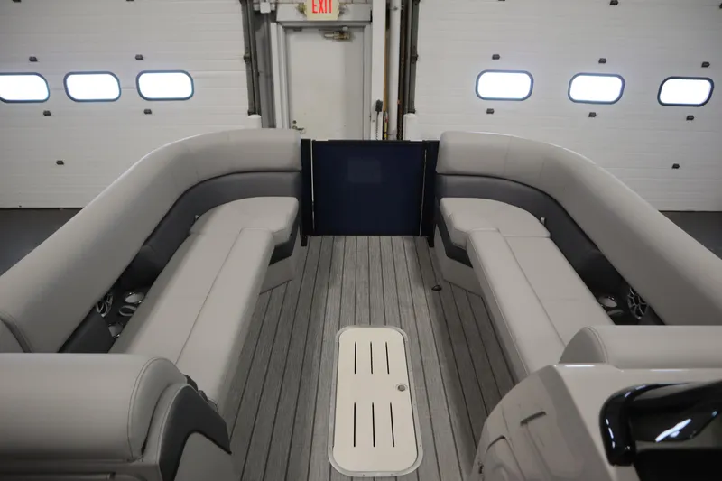 Slide: The Image of 2025 Bentley Pontoons Elite 253 Admiral Tri-toon interior with luxurious seating and modern design. - 10