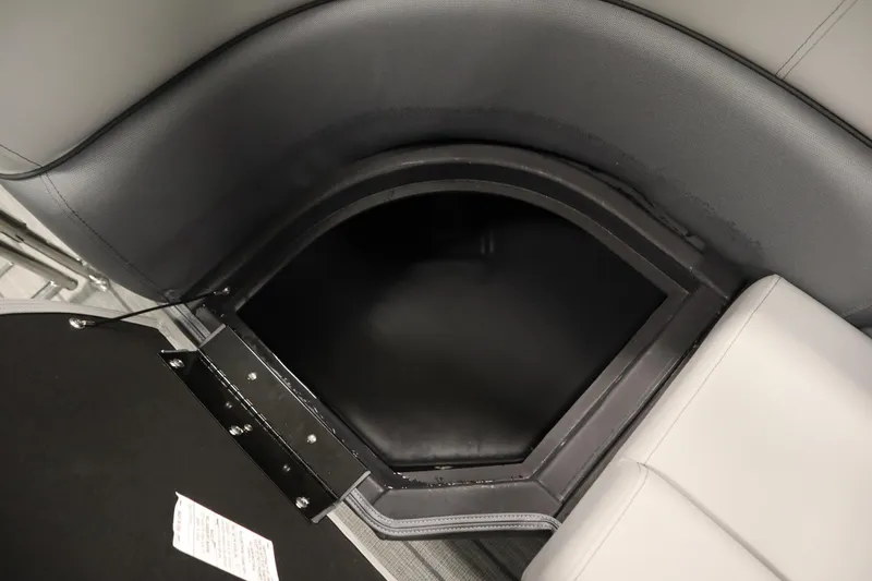 Slide: The Image of 2025 Bentley Pontoons Elite 253 Admiral Tri-toon storage compartment with sleek seating design. - 38