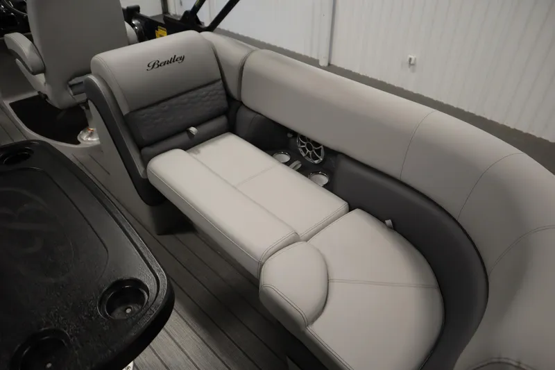 Slide: The Image of 2025 Bentley Pontoons Elite 253 Admiral Tri-toon interior seating, luxurious gray upholstery. - 39