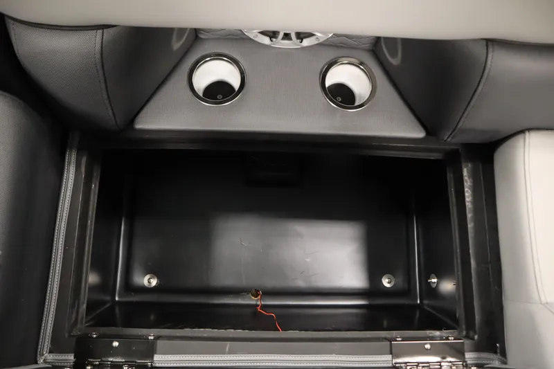 Slide: The Image of Storage compartment in 2025 Bentley Pontoons Elite 253 Admiral Tri-toon with cup holders. - 41