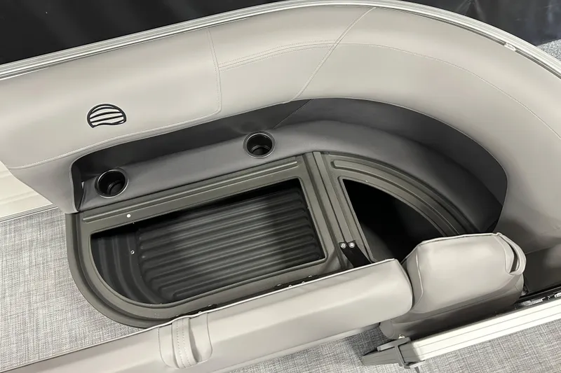 Slide: The Image of 2026 Sun Tracker Party Barge 16 DLX seating with storage and cup holders. - 7