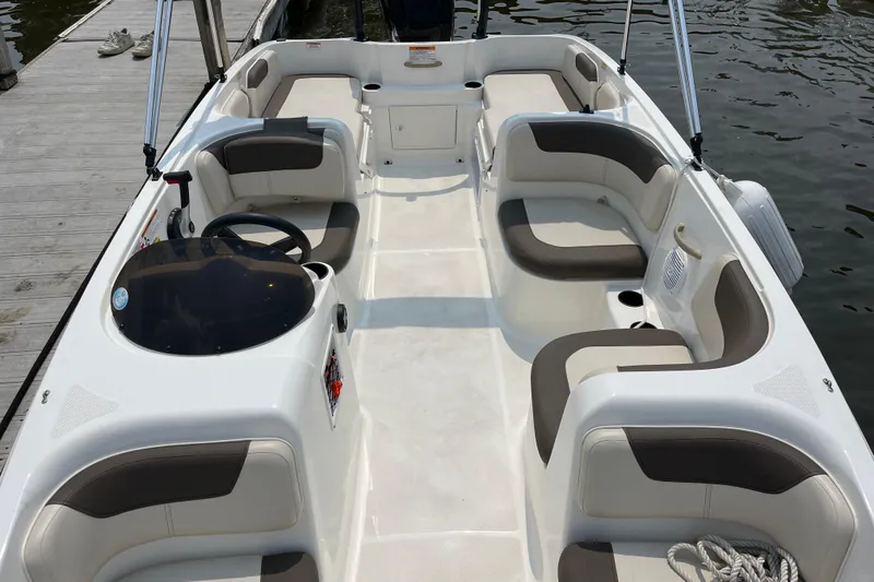 Slide: The Image of 2020 Bayliner Element boat interior with spacious seating and modern design. - 16