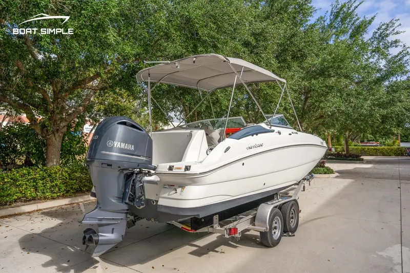 Slide: The Image of 2025 Hurricane SunDeck 2400 OB boat on trailer with Yamaha outboard motor. - 4