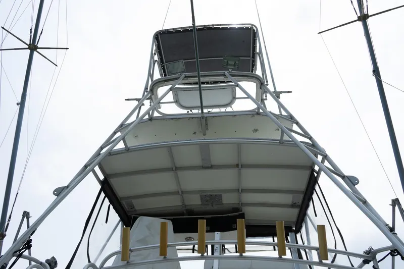 Slide: The Image of 1978 Bertram 35 Flybridge Sportfish, view of the flybridge structure from below. - 5