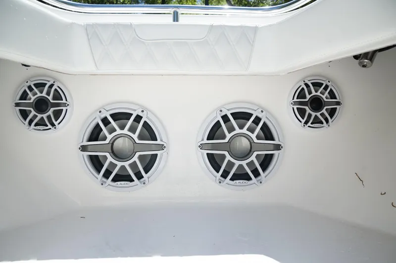 Slide: The Image of 2023 Contender 44 ST boat speakers, JL Audio, white interior, marine sound system. - 16