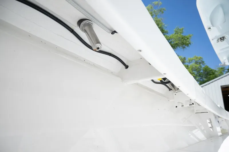 Slide: The Image of 2023 Contender 44 ST boat interior wiring and fittings under clear blue sky. - 19