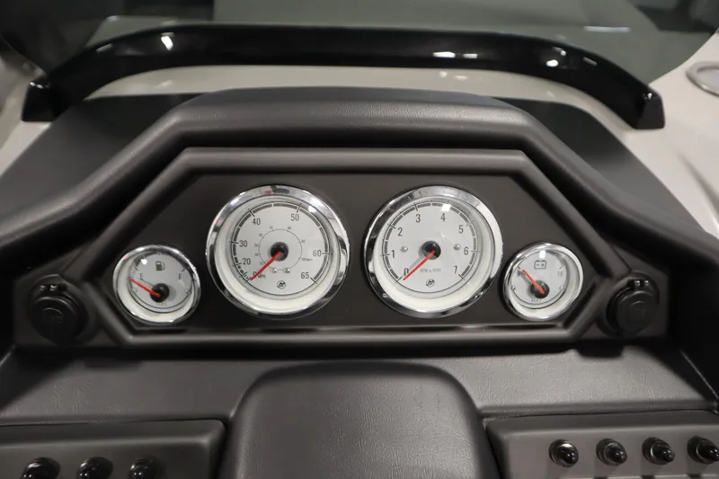 Slide: The Image of Dashboard of 2025 Bentley Pontoons Legacy 243 DL Navigator Tri-toon with gauges and controls. - 18