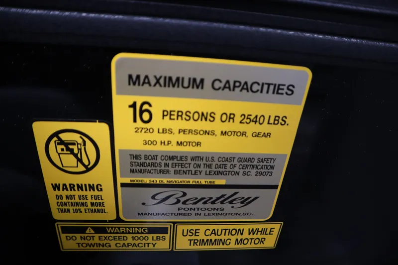 Slide: The Image of 2025 Bentley Pontoons Legacy 243 DL Navigator Tri-toon capacity label, 16 persons or 2540 lbs. - 23