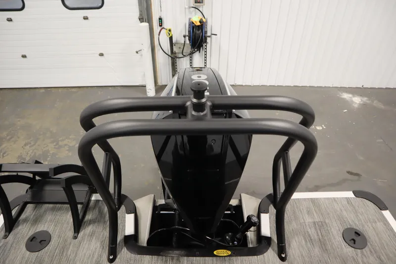 Slide: The Image of 2025 Bentley Pontoons Legacy 243 DL Navigator Tri-toon rear view in a garage setting. - 34