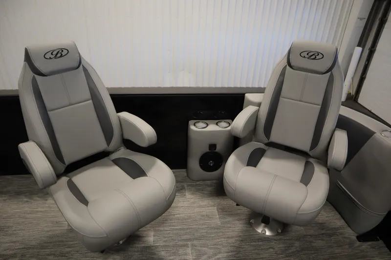 Slide: The Image of 2025 Bentley Pontoons Legacy 243 DL Navigator Tri-toon interior with luxurious seating. - 11