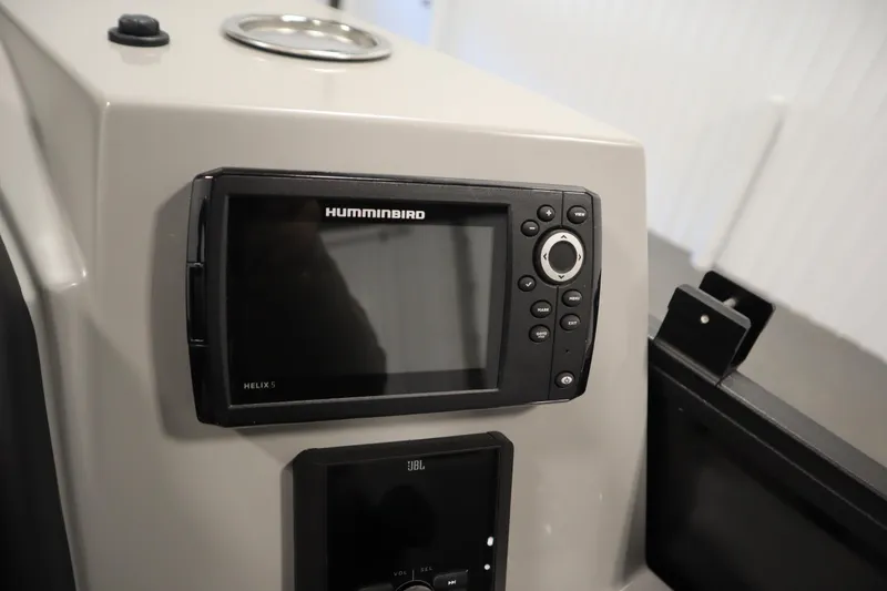 Slide: The Image of 2025 Bentley Pontoons Legacy 243 DL Navigator dashboard with Humminbird Helix 5 display. - 21