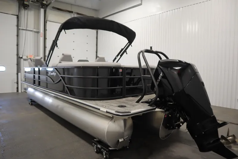 Slide: The Image of 2025 Bentley Pontoons Legacy 243 DL Navigator Tri-toon in indoor showroom. - 6