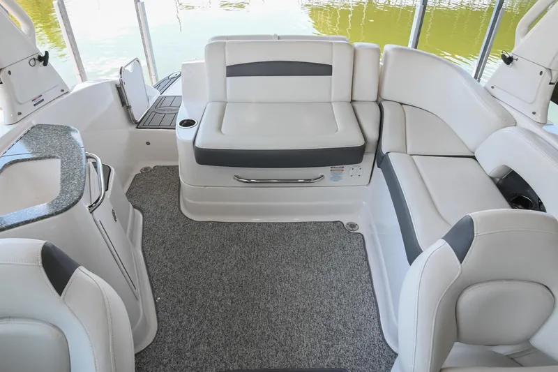 Slide: The Image of Interior of 2014 Chaparral 224 Sunesta boat with plush seating and modern design. - 17