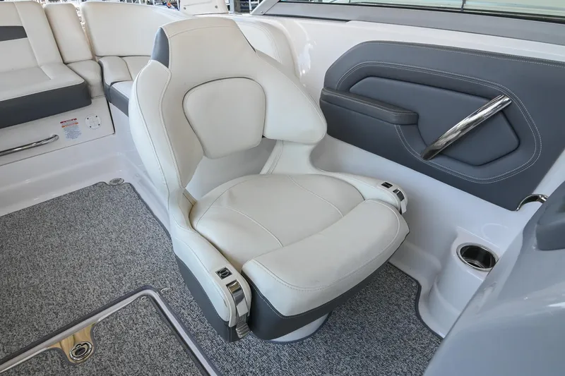 Slide: The Image of 2014 Chaparral 224 Sunesta boat interior with plush seating and modern design. - 27