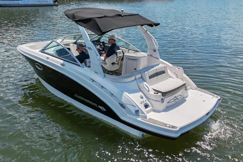 Slide: The Image of 2014 Chaparral 224 Sunesta boat cruising on a sunny lake. - 7
