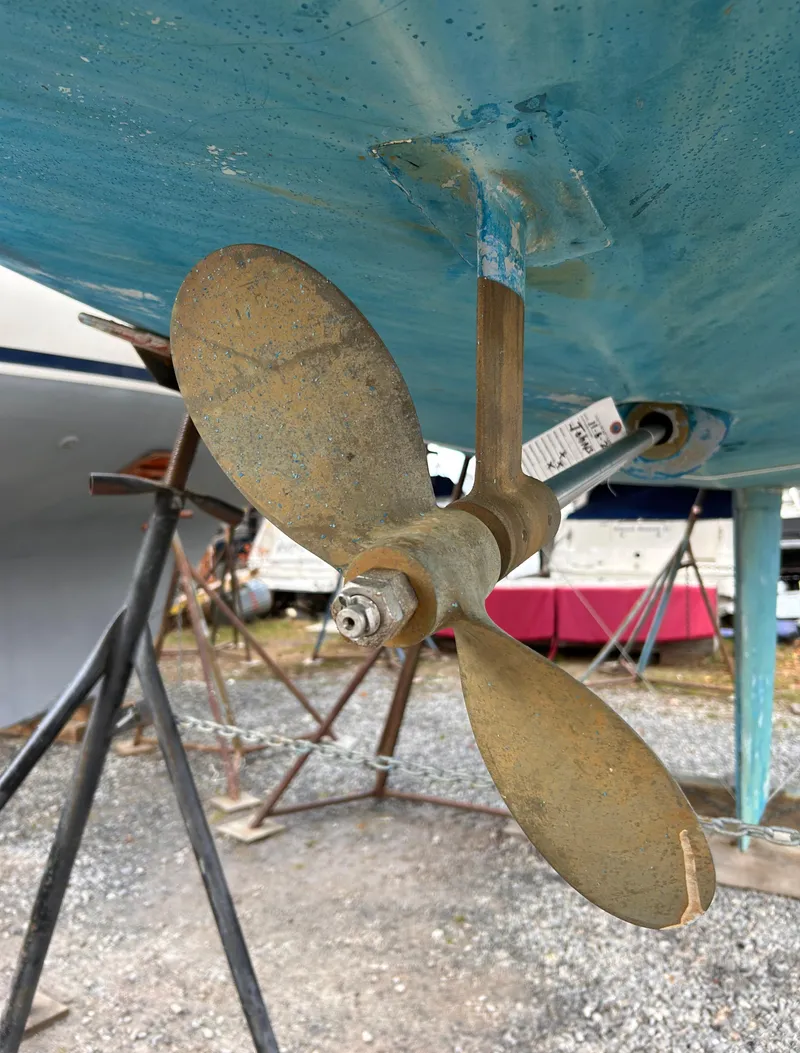 Slide: The Image of 1985 Pearson P-28 sailboat propeller on dry dock. - 10