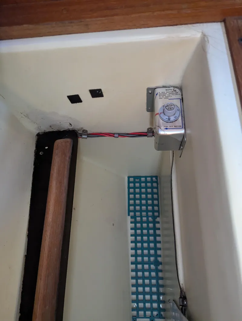 Slide: The Image of Electrical wiring inside 1985 Pearson P-28 boat compartment. - 24