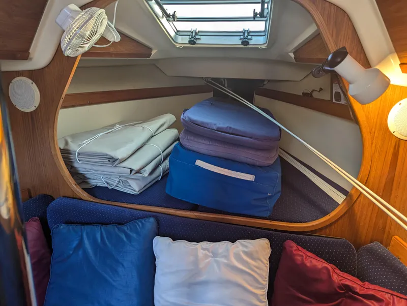 Slide: The Image of Interior of 1985 Pearson P-28 sailboat with cushions and hatch. - 26