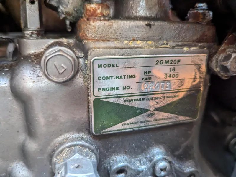 Slide: The Image of Yanmar diesel engine label on a 1985 Pearson P-28 sailboat, model 2GM20F, 16 HP. - 28