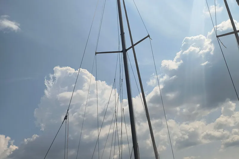 Slide: The Image of Sailboat mast of 1985 Pearson P-28 against a cloudy sky. - 29