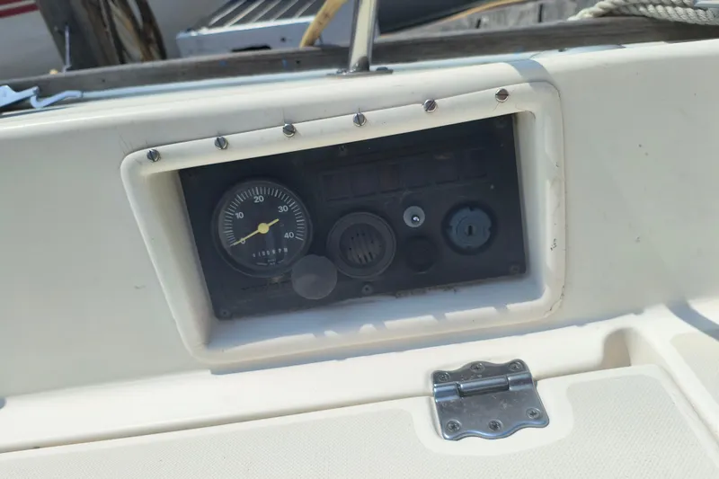 Slide: The Image of Control panel of a 1985 Pearson P-28 sailboat with gauges and switches. - 35