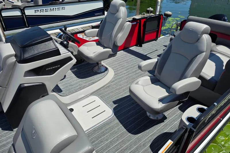 Slide: The Image of 2025 Premier 210 SunSation RE boat interior with luxurious seating and modern design. - 11