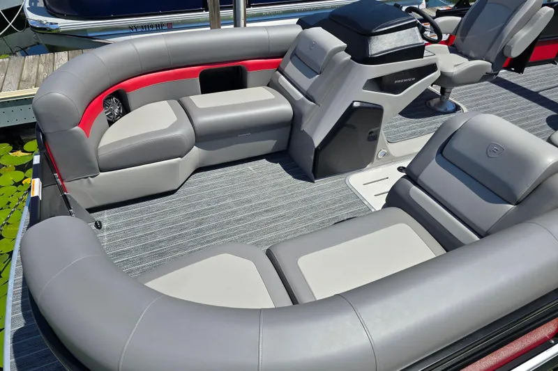 Slide: The Image of 2025 Premier 210 SunSation RE pontoon boat with luxurious seating and modern design. - 19