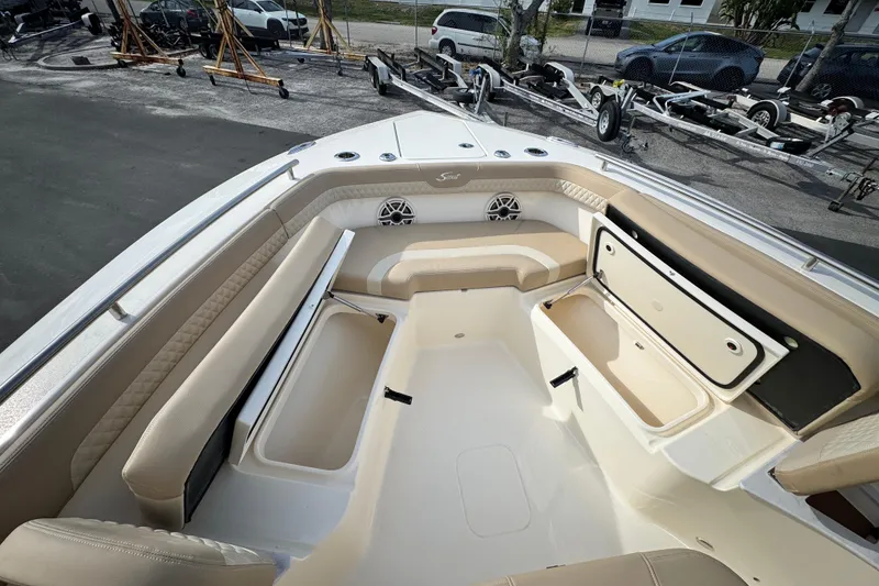 Slide: The Image of 2026 Scout 260 LXF boat interior with seating and storage compartments. - 20