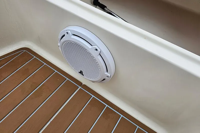 Slide: The Image of Speaker installed on Bulls Bay 2000 boat, 2022 model, with wooden deck flooring. - 20