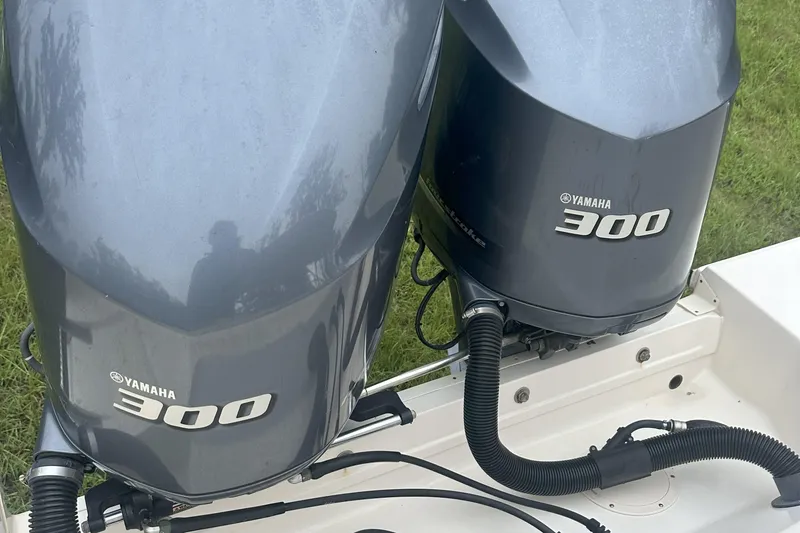 Slide: The Image of Twin Yamaha 300 outboard engines on a 2015 Grady-White Freedom 285 boat. - 10