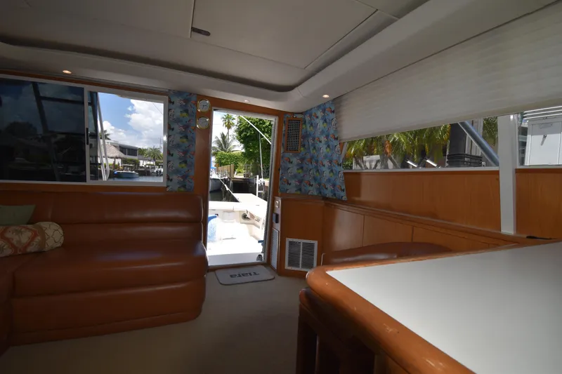 Slide: The Image of Interior of 1997 Tiara 4300 yacht with leather seating and tropical decor. - 26