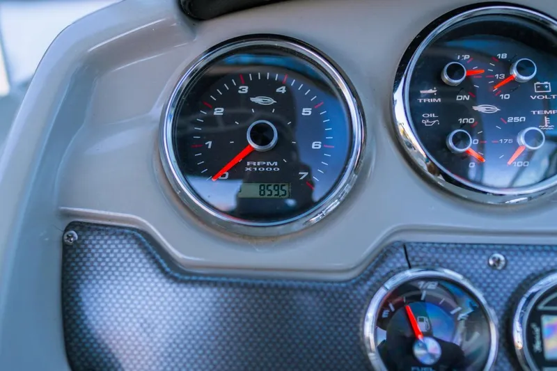 Slide: The Image of Dashboard of 2018 Chaparral 210 Suncoast boat showing RPM and gauges. - 5
