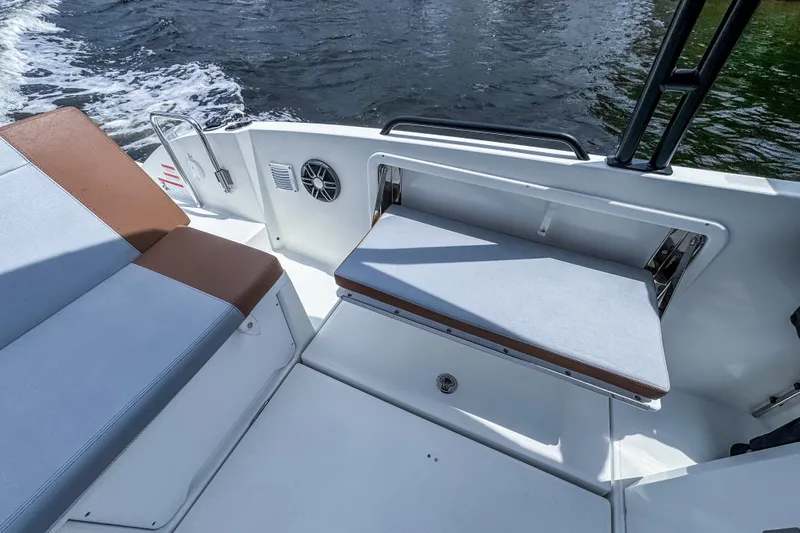 Slide: The Image of 2022 Beneteau America Flyer 8 Sundeck interior with seating and water view. - 16