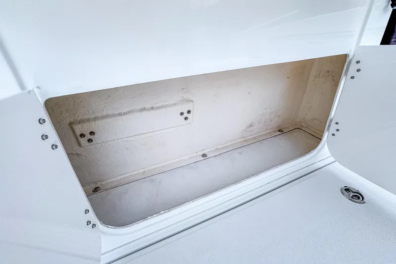 Slide: The Image of Storage compartment on 2022 Beneteau America Flyer 8 Sundeck boat, open and empty. - 19